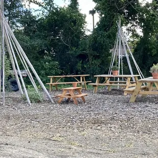 An area with picnic tables where they hold their weekly story-time