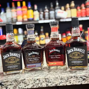 three bottles of jack daniels