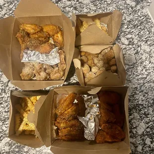 three boxes of fried food