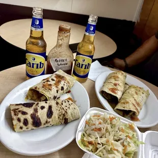 Goat Roti &amp; Vegetable Roti with Cabbage &amp; Carib Beers.