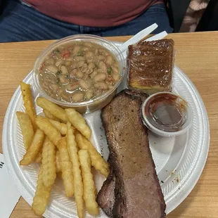 Brisket, pinto beans, fries, cornbread