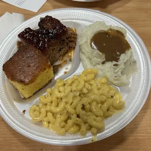 Meatloaf, mashed potatoes with brown gravy, Mac n cheese, cornbread