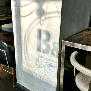 The B of the B&amp;O reflection from the window, looks like the 1.3 of the Charm'tastic Mile.