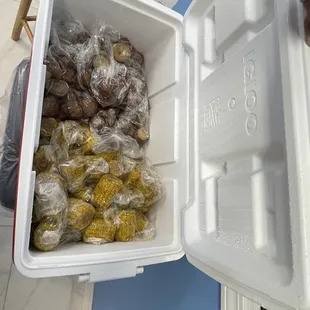 a cooler filled with food