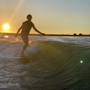 Sunset water sports on the smooth delta water.