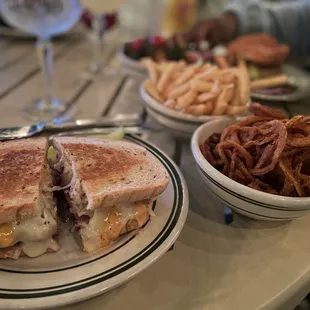 Ruben Sandwich, onion rings, french fries