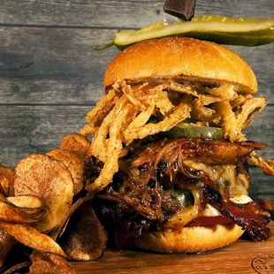 a pulled pork sandwich with pickles