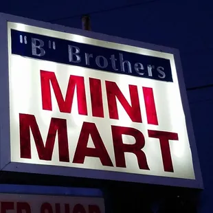 a sign for a mini mart