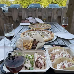 Tacos, wings and fries, and large pizzas