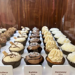 a variety of cupcakes on display