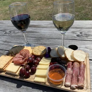Charcuterie board and wine