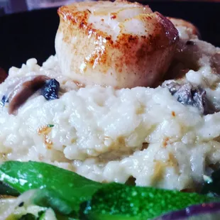 Jumbo Sea Scallops atop mushroom parmesan risotto