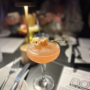 a cocktail in a coupe glass