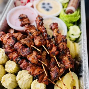 Feast platter with more bbq underneath