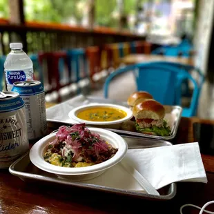 Sweata weatha carnitas and grits, salmon sliders and carrot curry soup. 10/10 will eat here again, all delicious.