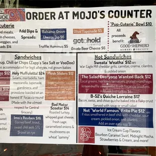 Menu in the window - don't let the record storefront fool you! Get in there and place your order at the checkout counter.