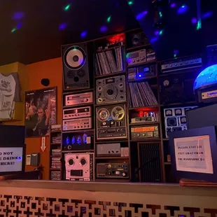 a bar with a lot of audio equipment