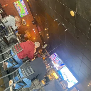 people sitting at the bar