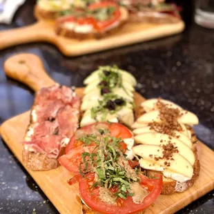 Mozzerella Basil Tomato, Apple Brie Spicy Crushed Nuts, Pear Brie Basil Honey, and Prosciutto Gorgonzola Bruschettas