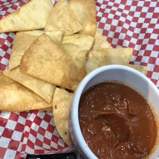 Homemade flour and corn chips and salsa.