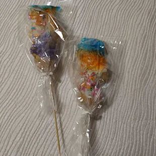 King Cake ON A STICK! About 6" long.