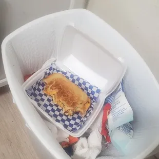 Gross grilled cheese sandwich I tried to finish but got sick to my stomach.