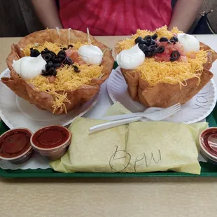 2 beef taco salads and a beef quesadilla