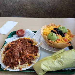 Chili  cheese fries, Tostada salad, and a Combo burrito.