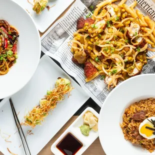 a variety of asian food on a table