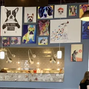 The doggie (art) wall, with a view into the kitchen.