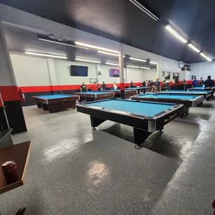 pool tables in a large room