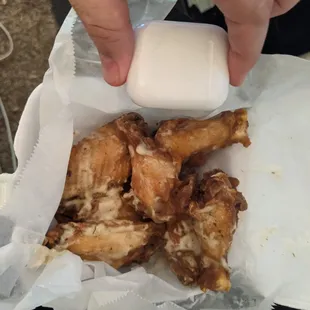 7.5 oz of wings vs my Airpod case for size perspective.