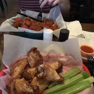 Spicy boneless chicken and plane fried chicken with celery.