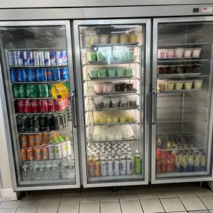 a refrigerated refrigerator full of drinks