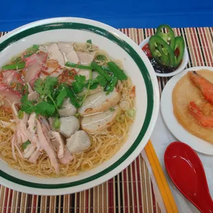 Chicken soup with fishballs, fishcake, chicken and cha siu