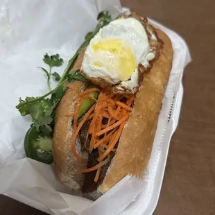 a sandwich in a styrofoam container