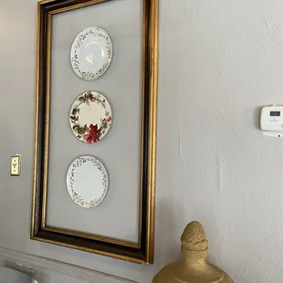 three plates on a wall