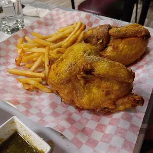 Whole chicken with fries.