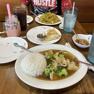 We got the broccoli pad Thai with pork and white rice and a caschew with pork curry fried rice