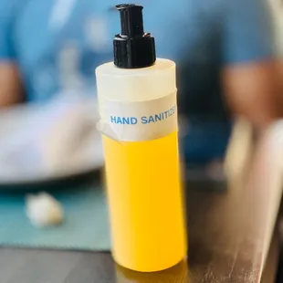 Hand sanitizer provided at the table