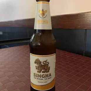 a bottle of beer on a table