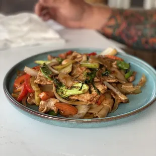 a plate of stir fried vegetables