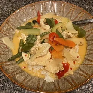 Gang ped (spicy red curry) with chicken. Incredibly flavorful.