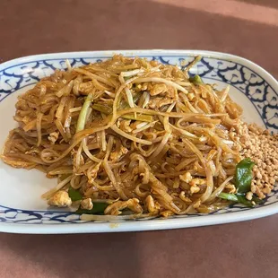Chicken Pad Thai. Not spicy so ask for it that way or add your own chili