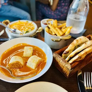 Paneer Pinwheel, veggie Mac and cheese, masala fries, garlic naan