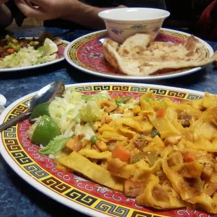 K.K. (keke) in foreground and sabaayad/broth/Beef Suqaar in background.