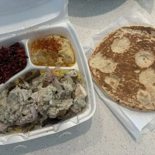 Gyro plate with sumac onions, hummus and red cabbage