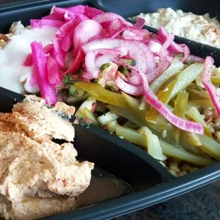 Chicken Shawarma Plate (including CousCous + Spicy Hummus + Baba Ganoush). $8.99.