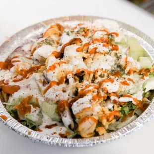 Chicken kabob bowl! Topped with our famous sauces!