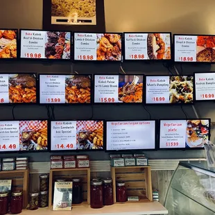 Inside: multiple small screens displaying photos of popular menu items just to your left upon entering